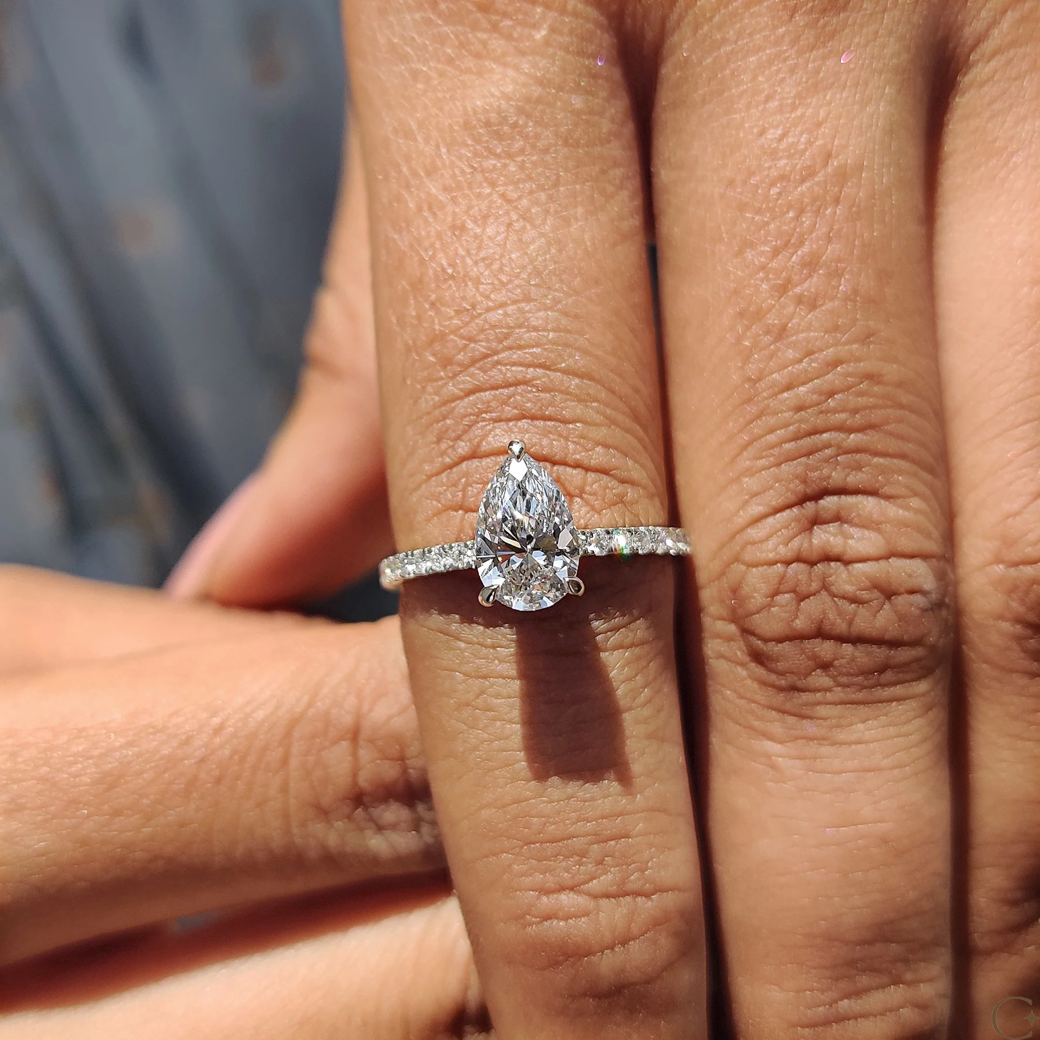 Pear Cut Engagement Ring With Hidden Halo Design - Image 7