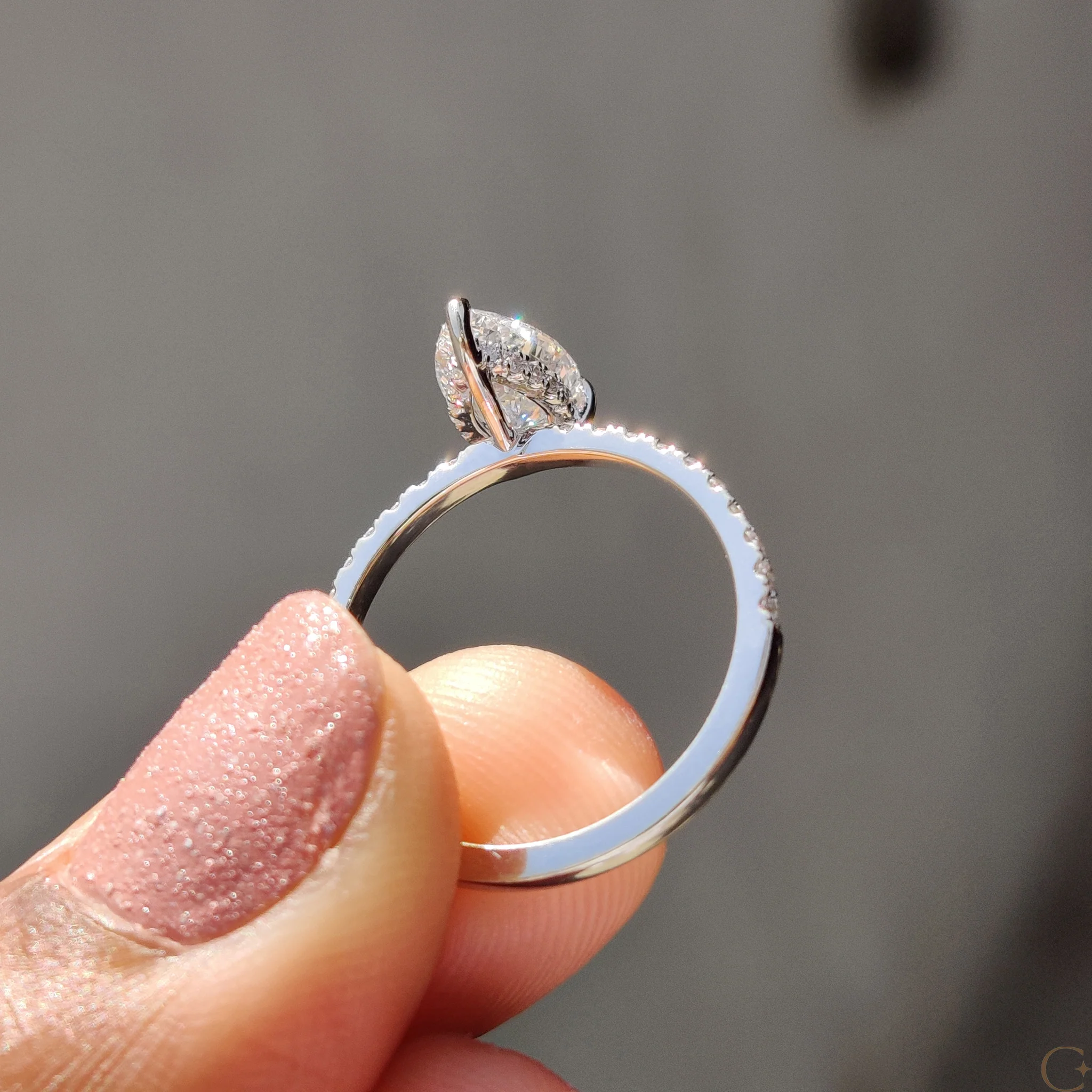 Pear Cut Engagement Ring With Hidden Halo Design - Image 8