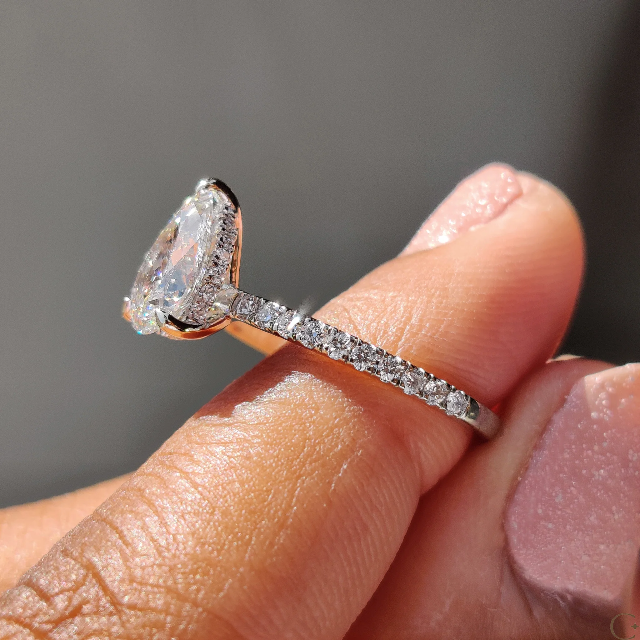 Pear Cut Engagement Ring With Hidden Halo Design - Image 9