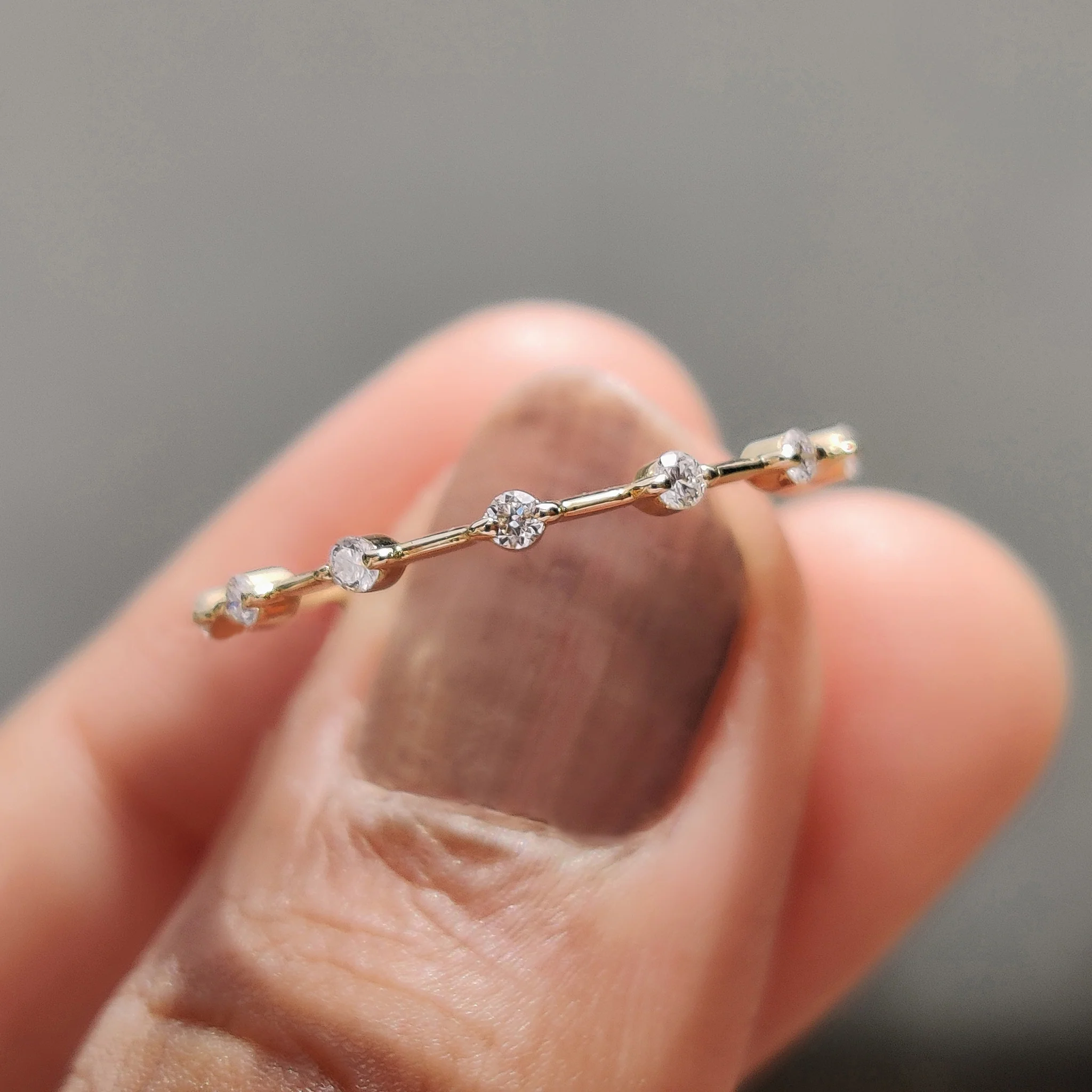 Round Diamond Eternity Band in Distance Pave Style - Image 5